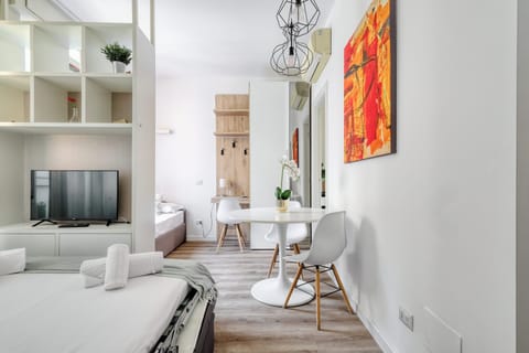 Apartment, 2 Bedrooms, Balcony | Living area | 32-inch flat-screen TV with cable channels