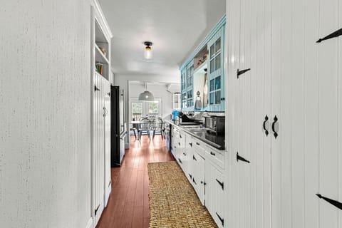 View of your galley style kitchen from the entry way.