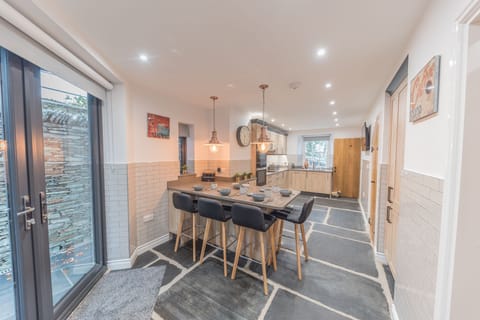 Cragg Cottage kitchen showing double doors out to rear patio