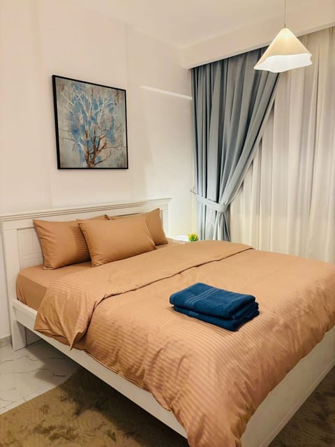 Premium bedding, desk, laptop workspace, soundproofing