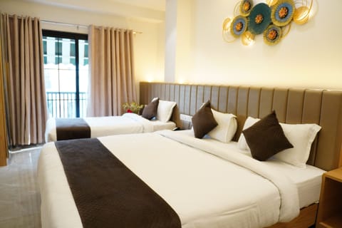 Family Room | Premium bedding, down comforters, Select Comfort beds, laptop workspace