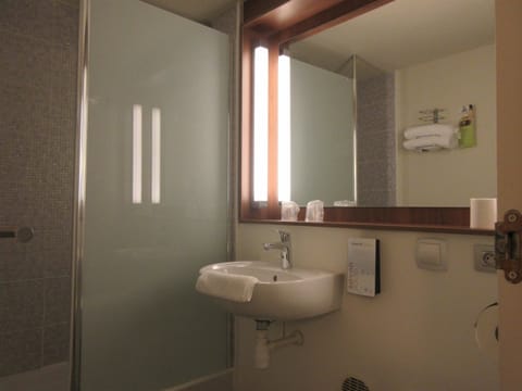 Eco-friendly toiletries, hair dryer, towels