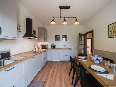 Kitchen, Countertop, Interior Design, Furniture, Kitchen Appliance, Cabinetry, Wood, Ceiling, Flooring, Major Appliance