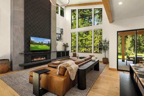 Grand Mountain Estate. - Grand great room with soaring 25ft. ceilings, 75" TV, and a gas fireplace.