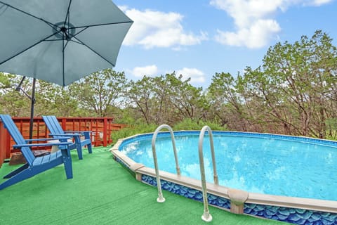 The pool has a small deck alongside the pool.