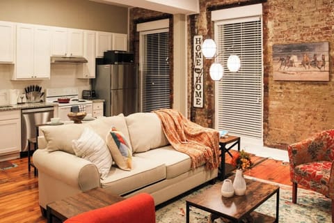 Living room with full kitchen and open layout 