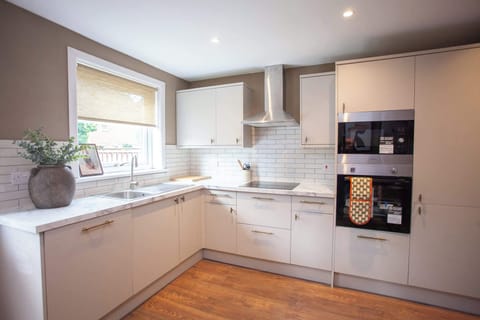 Brand new kitchen with coffee machine