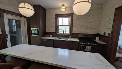 A unique backdrop for enjoying meals and conversation at the sleek marble island