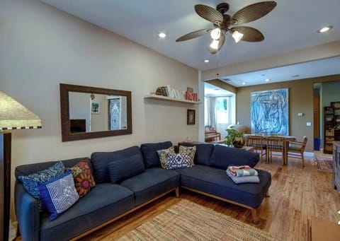 LIVING ROOM 
Cozy living room with a large sectional sofa. Perfect for relaxing.
