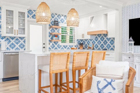 Large kitchen island with seating—the heartbeat of the home.