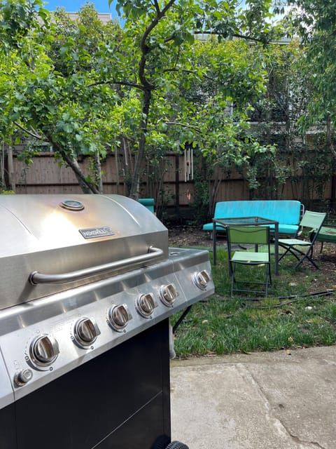 BACKYARD 
This backyard features a BBQ station and a comfy seating for relaxing.