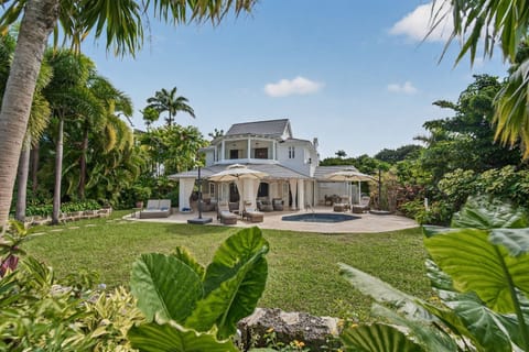 A secluded private pool area within manicured garden