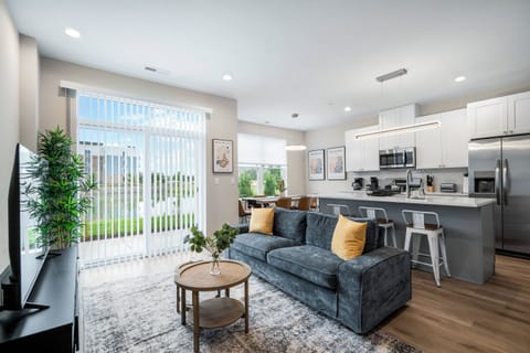 Family Apartment, Pets Allowed, Lake View | Living area | 55-inch TV with digital channels, streaming services