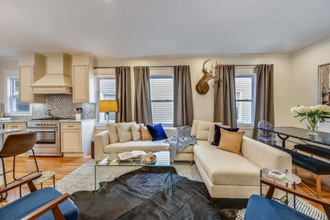 Unit 3 | Open Concept Living Room | XL Flat Screen TV | Natural Light | Third Floor
