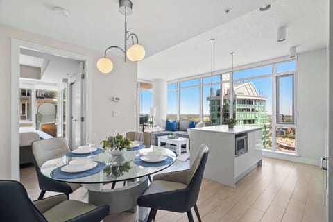 Open layout kitchen, dining, and living area