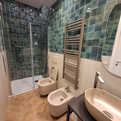 Bathroom | Shower, free toiletries, bathrobes, towels