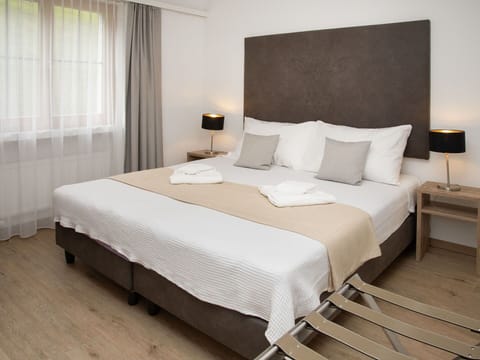 Furniture, Interior Design, Flooring, Floor, Bed, Bedroom, Wood, Room, Textile, Linens