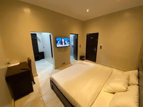 Deluxe Room, Balcony, City View | Desk, laptop workspace, blackout drapes, soundproofing