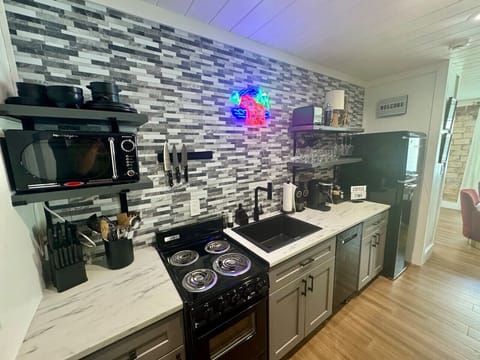 Fully equipped kitchen & wet bar