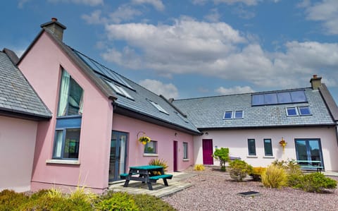 Derrynane Oceancove Holiday Homes Co Kerry. Family holiday accommodation, outside seating and dining with sea views.