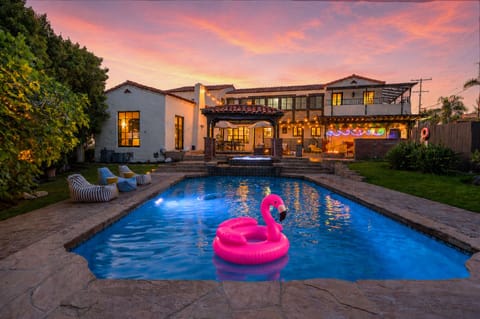 Enjoy poolside paradise with floaty toys, ensuring endless fun under the San Diego sun at Modern Mediterranean