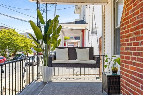 Charming Porch with Relaxing Swing