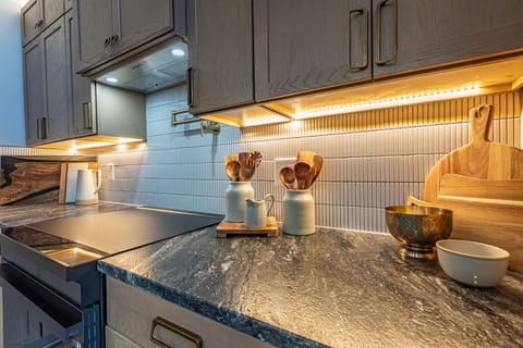 Our fully stocked kitchen features high-end appliances and ample cooking space—perfect for preparing delicious meals and enjoying quality time together.