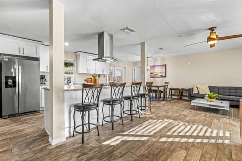 Gather ‘round the large island — where great meals and even better conversations happen. Fully stocked and ready for your culinary adventures!