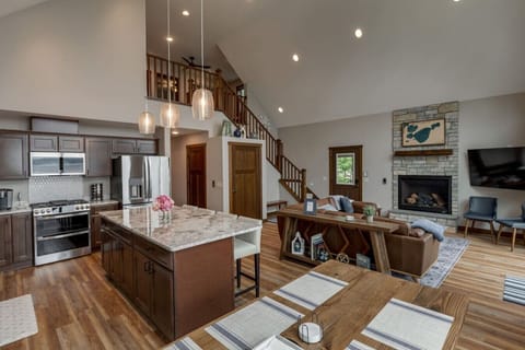 Open concept floor plan; Kitchen, dining, & living room spaces. Perfect for large gatherings with family and friends