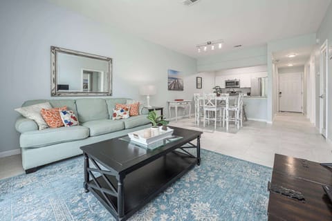 Bright living area with Smart TV, and sofa sleeper 