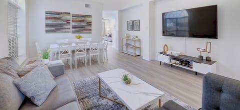 Bright and spacious, this open-concept living and dining area is ideal for movie nights, games, or shared meals. Relax here after a day exploring Austin’s trails or downtown attractions.