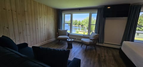 Watch the lake shimmer from your private indoor nook.