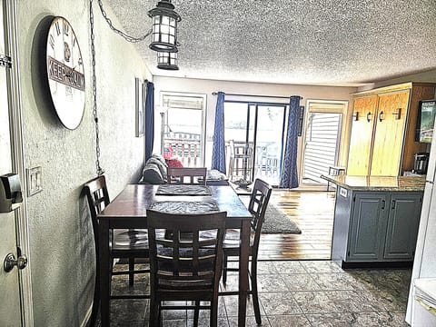 View from bedroom door through condo to the lake.
