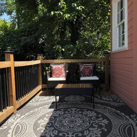 The deck has seating for four