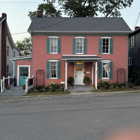 Locals call it "Salmon House" or "Miami Vice House" bc of the unique coloring