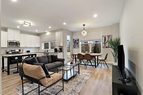 Family Apartment, Multiple Beds, Lake View | Living area | 55-inch Smart TV with digital channels, streaming services