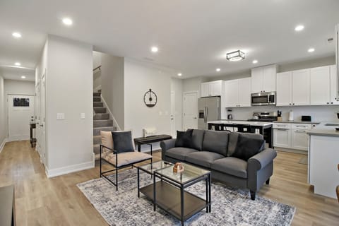 Family Apartment, Multiple Beds, Lake View | Living area | 55-inch Smart TV with digital channels, streaming services