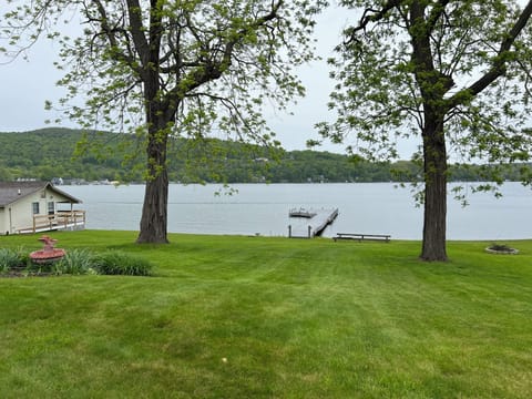 1.9 acres with dock, house view to cottage