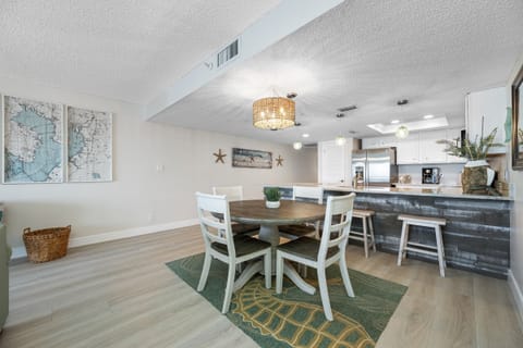 Dining area for 4 with a chandelier