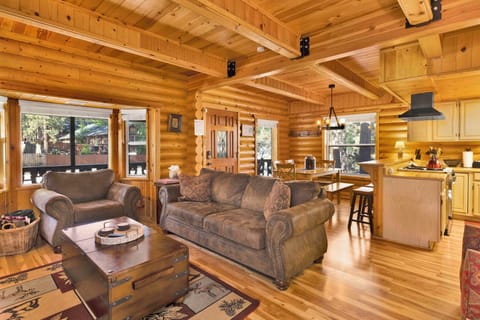 Living room open concept to kitchen, cozy fireplace