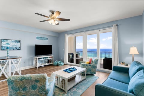 Relax in this coastal living room with ocean views and comfortable seating.