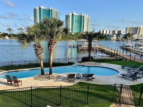 Beautiful pool with view overlooking Cotton Bayou.  Please note this pool is shared with 2 other neighbors.  You must swim at your own risk.  