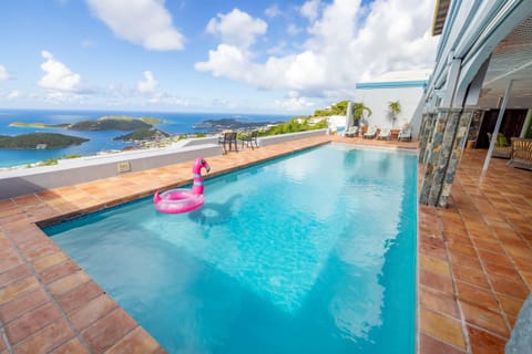 This large pool located off the open living room leads to the incredible panoramic views