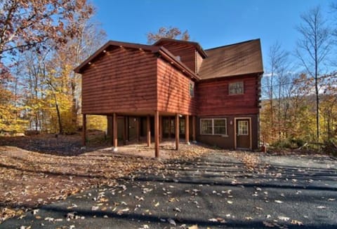 Front of house and long trail like private driveway 
