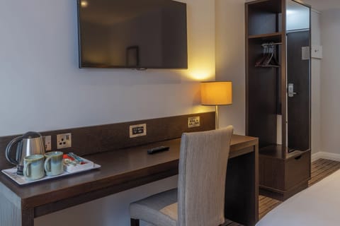 Blackout drapes, soundproofing, iron/ironing board, free WiFi