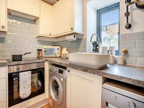 Kitchen | The Old Cowsheds 1 - Dairy - Gaer Cottages, Cribyn, Lampeter