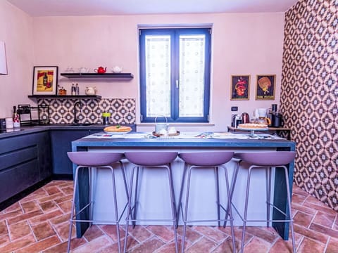 Furniture, Interior Design, Flooring, Kitchen, Floor, Lighting, Countertop, Room, Bar Stool, Home