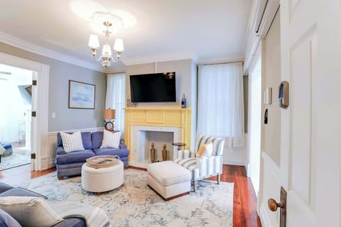 This is what you see when you first open the door to your apartment. The bedroom is on the far left, the kitchen is on the far right, and the bathroom is immediately to your right as you enter the space. It is fun and cozy!