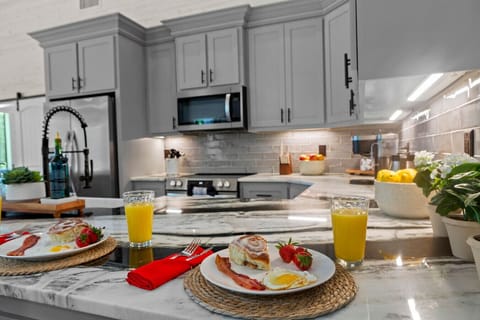 Mornings made better—fresh coffee, sunshine, and breakfast in a kitchen that feels like home.