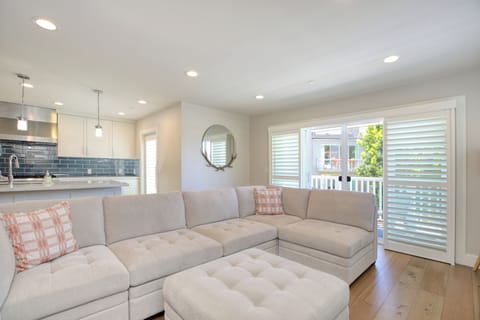 Step inside to discover an airy, open-concept living space drenched in natural light, perfectly designed for effortless entertaining and laid-back relaxation.